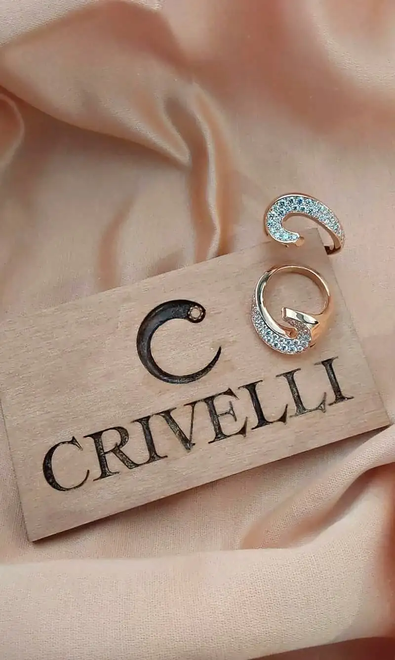 Anelli Crivelli in oro rosa con pavé di diamanti