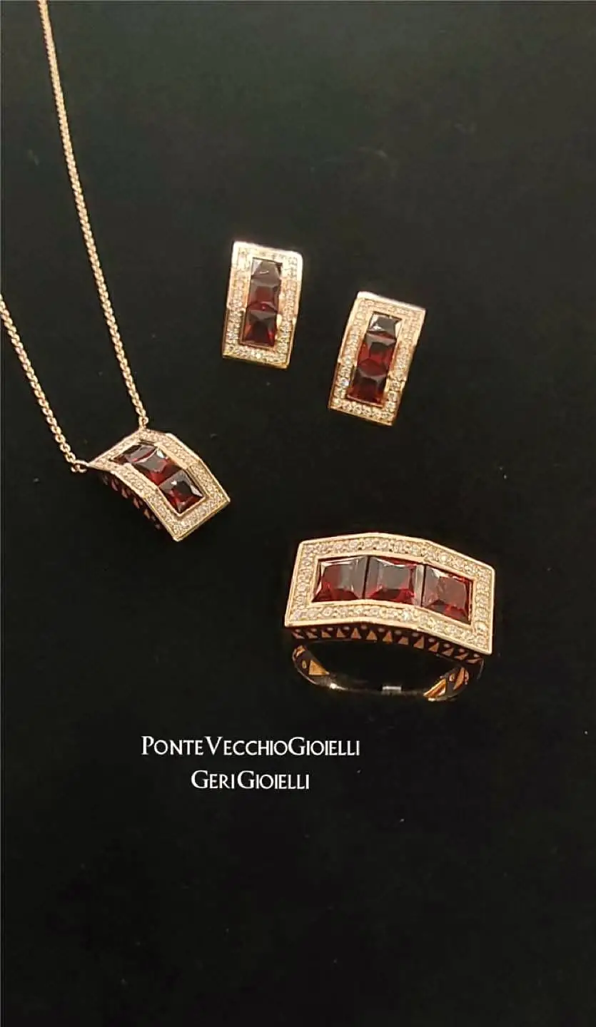 Parure Ponte Vecchio Gioielli con pietre rosse e diamanti: collana, orecchini e anello